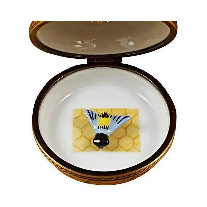 The painter's artistry shows on this Beehive with Bee Limoges box