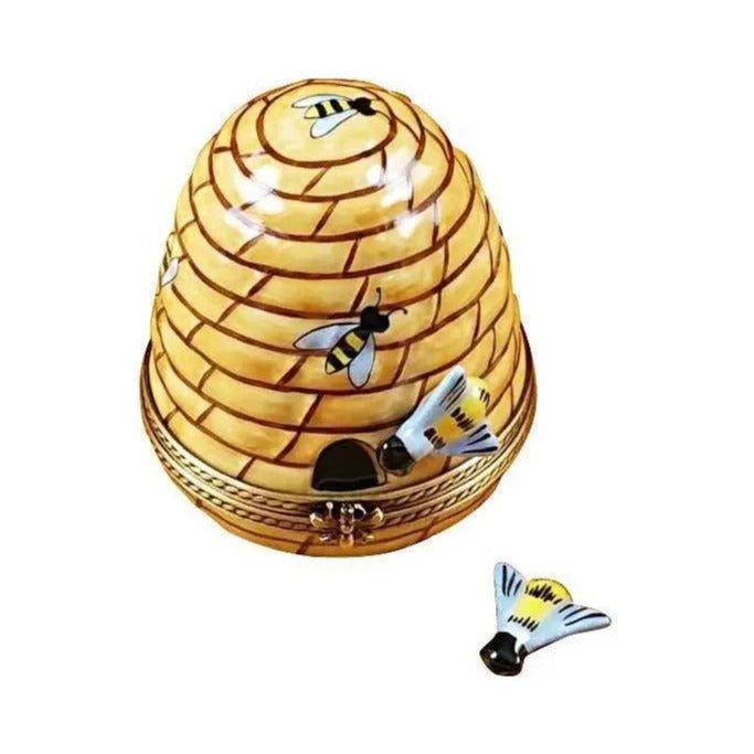 Limoges Boutique presents the Rochard Beehive with Bee, a genuine Limoges box painted by hand in France