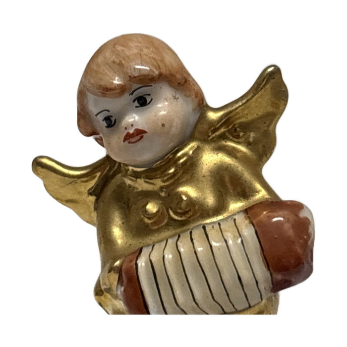Gold angel with accordion Limoges box