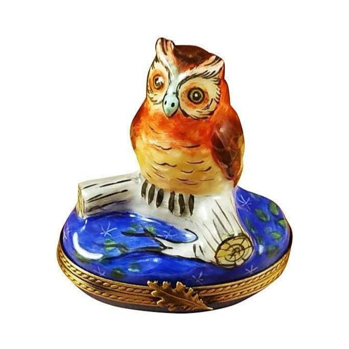 Limoges Boutique presents the Rochard Great Owl on Blue Base, a genuine Limoges box painted by hand in France