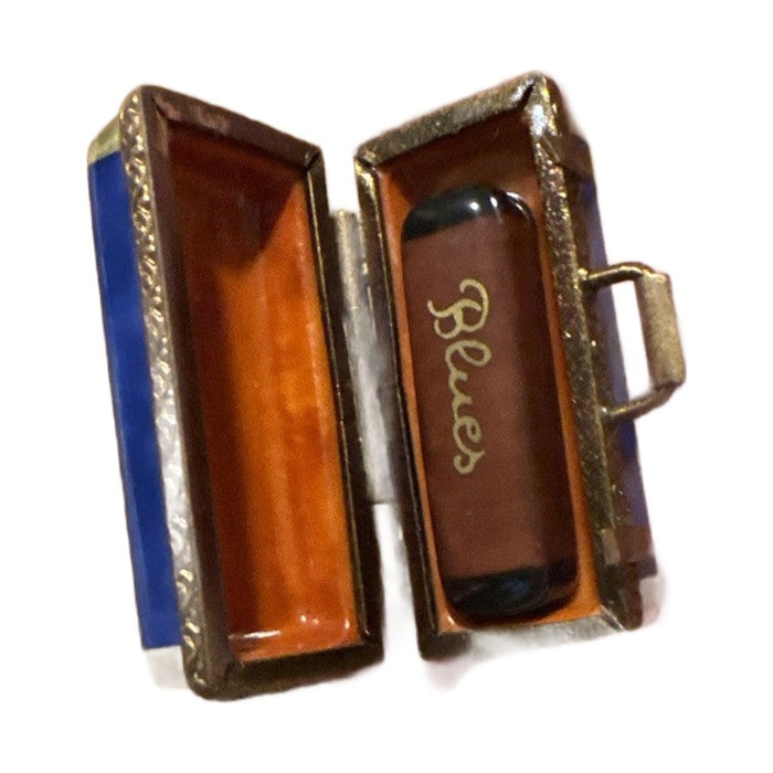 Harmonica and blues Limoges box opened - white background