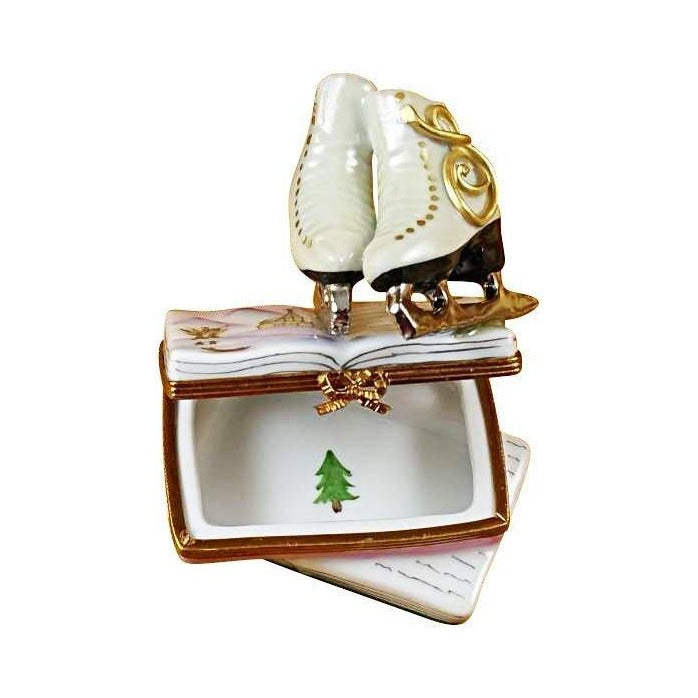 Every brushstroke by hand on the Ice Skates on Book Snow Limoges box from France
