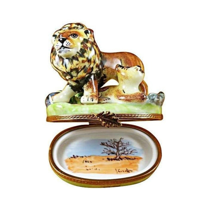 Fine French craftsmanship on the Lion with Baby Limoges box, painted by hand