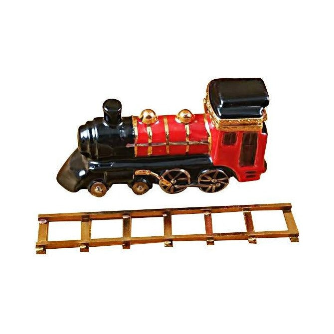 Fine French craftsmanship on the Locomotive Train on Brass Track Limoges box, painted by hand