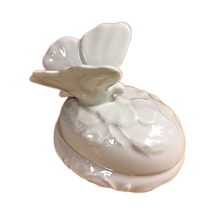 Detail of the butterfly on the white Limoges porcelain box