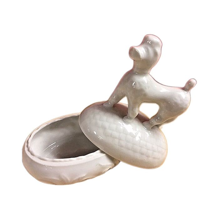 White French poodle Limoges box with the lid lifted off, no hinge
