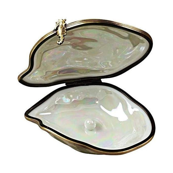 Oyster Pearl Inside Limoges box opened to show the inside, a keepsake to tuck a treasure in