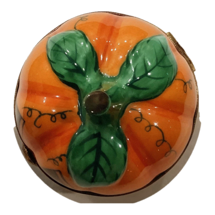 Halloween pumpkin Limoges box, top view with green leaves and vines