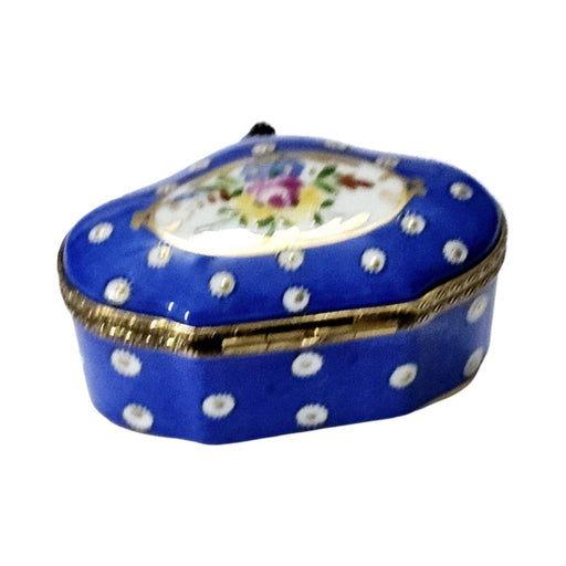 Every brushstroke by hand on the Blue Scalloped with Flowers Limoges box from France
