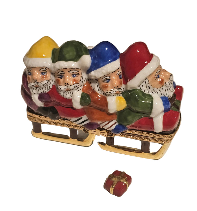 Santas in Sleigh w Present Rare