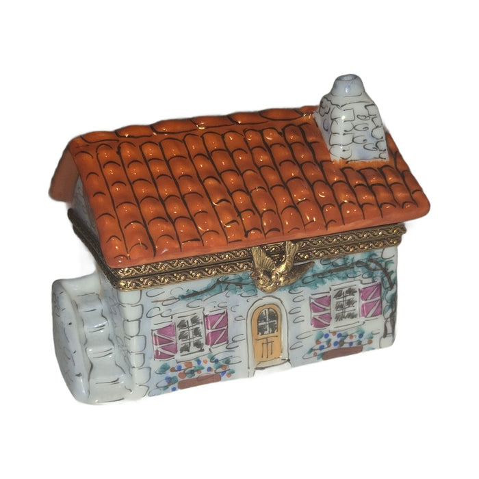 Every brushstroke by hand on the White House with Red Roof Cottage Limoges box from France