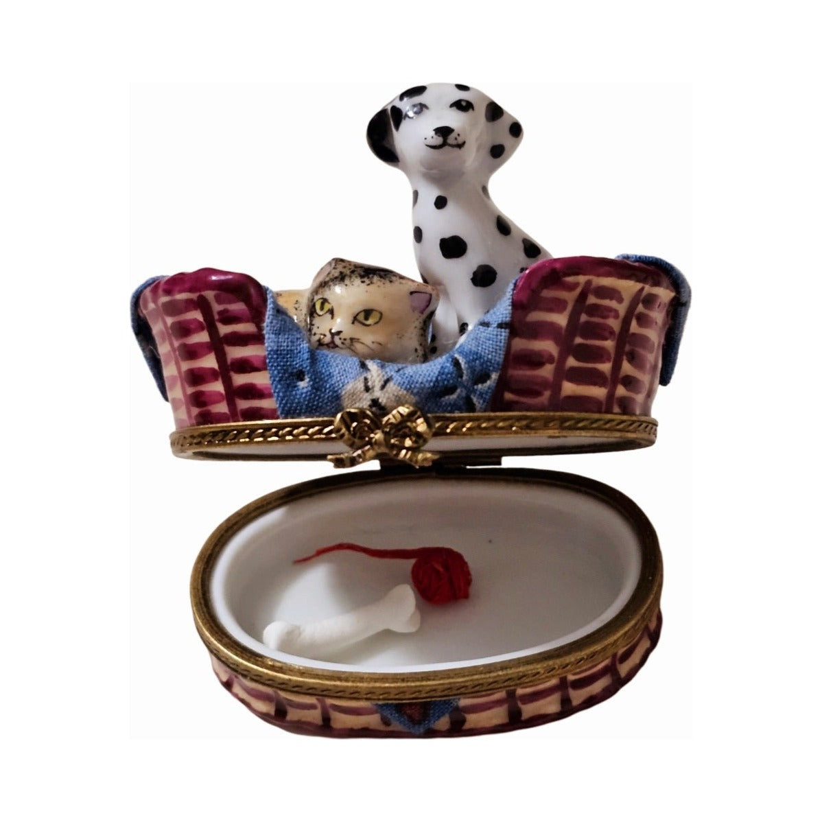Fine French craftsmanship on the Dalmatian Dog with Cat in Basket with Trinkets Limoges box, painted by hand