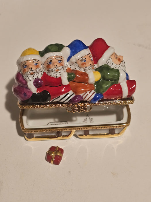 Santas in Sleigh w Present Rare