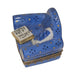 Fine French craftsmanship on the Blue Comfy Chair with Book Limoges box, painted by hand