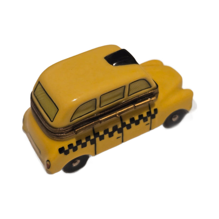 The painter's artistry shows on this Yellow Taxi Limoges box