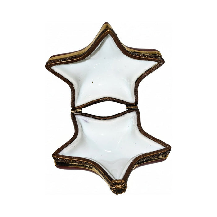 Fine French craftsmanship on the Unsigned Christmas Star Limoges box, painted by hand