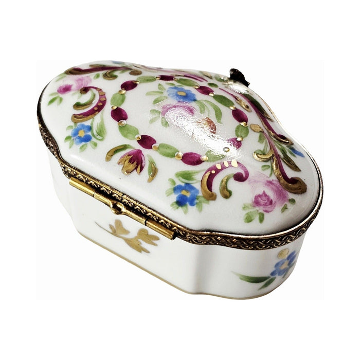Artisan-painted Shaped with Pink Flowers Limoges box from France, a cherished collectible