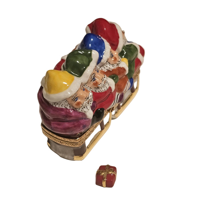 Santas in Sleigh w Present Rare