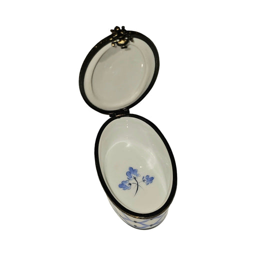 Every brushstroke by hand on the Blue Vase on White Limoges box from France