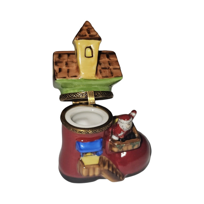 The painter's artistry shows on this Santa's Workshop Boot Limoges box