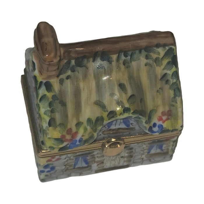 Artisan-painted Yellow Cottage House Limoges box from France, a cherished collectible
