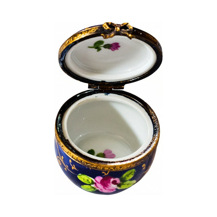 Fine art lovers will admire this Cobalt Blue Round with Roses Limoges box