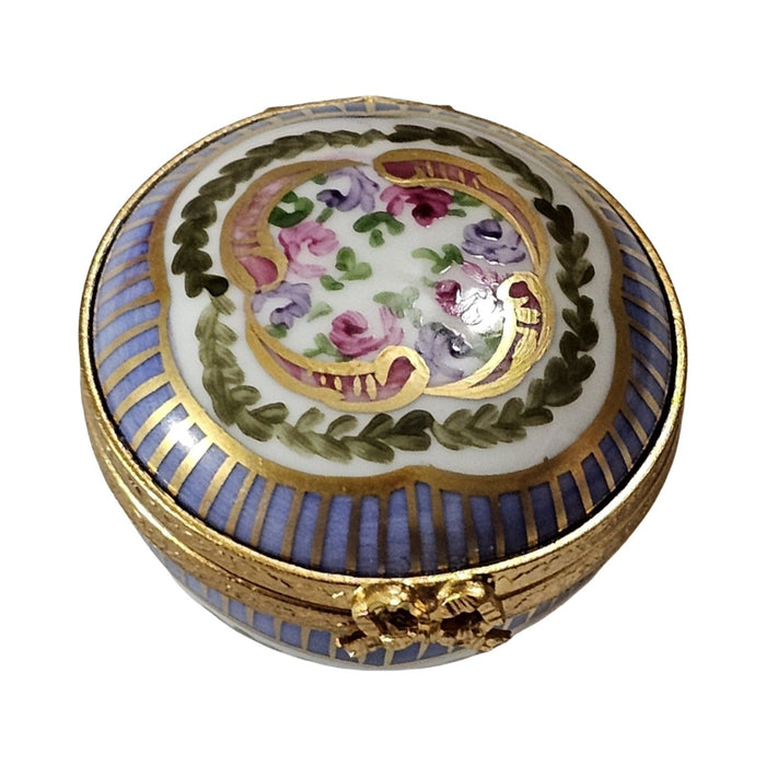 Every brushstroke by hand on the Round Periwinkle with Flowers Limoges box from France
