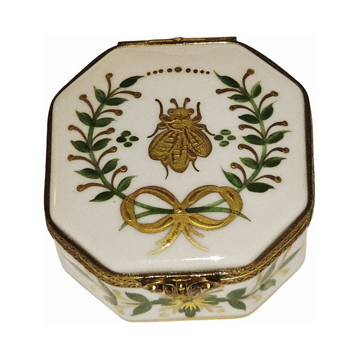 Every brushstroke by hand on the Emperor Gold Bee Wreath Hexagon Limoges box from France