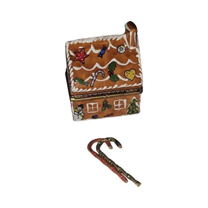 The painter's artistry shows on this Gingerbread House with Canes Limoges box