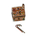 The painter's artistry shows on this Gingerbread House with Canes Limoges box
