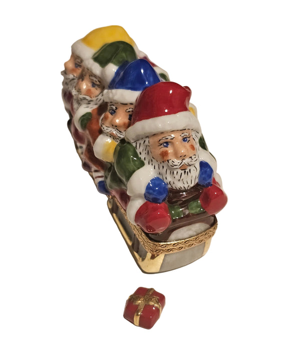 Santas in Sleigh w Present Rare