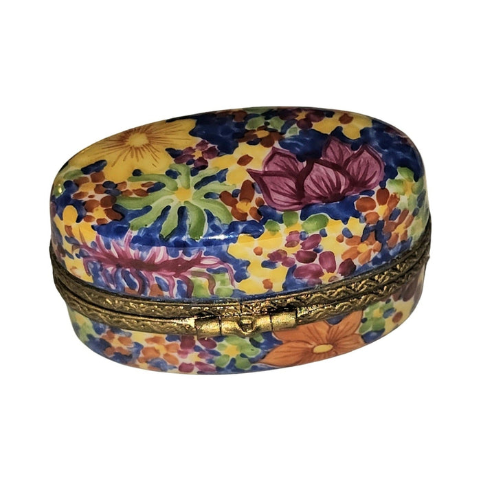 The painter's artistry shows on this Colorful Floral on Oval Limoges box