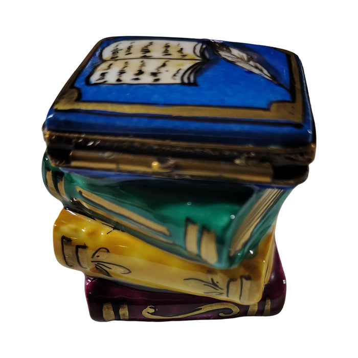 Painted details on the Stack of Books Limoges box, French art in miniature