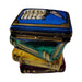 Painted details on the Stack of Books Limoges box, French art in miniature
