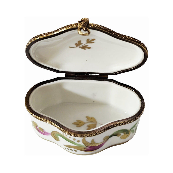 Painted details on the Shaped with Pink Flowers Limoges box, French art in miniature