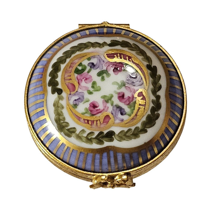 Fine art lovers will admire this Round Periwinkle with Flowers Limoges box