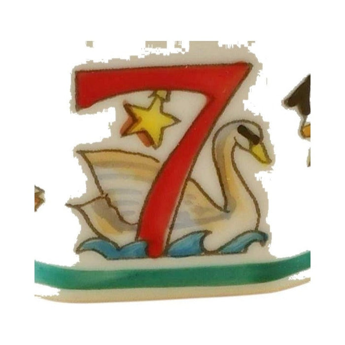 Seven swans a-swimming beside a red number 7 on the Rochard Twelve Days of Christmas box