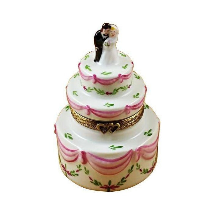 Limoges Boutique presents the Rochard Wedding Cake with Bride and Groom, a genuine Limoges box painted by hand in France