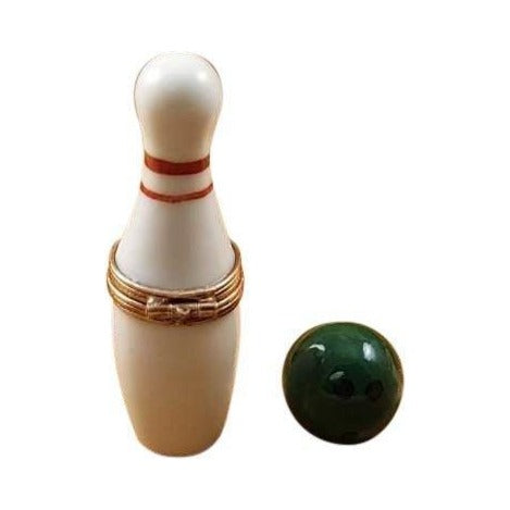 Fine French craftsmanship on the White Bowling Pin with Green Removable Ball Limoges box, painted by hand