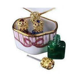 Odd Shape 4 Perfume Bottles Limoges box, an heirloom-quality piece for collectors