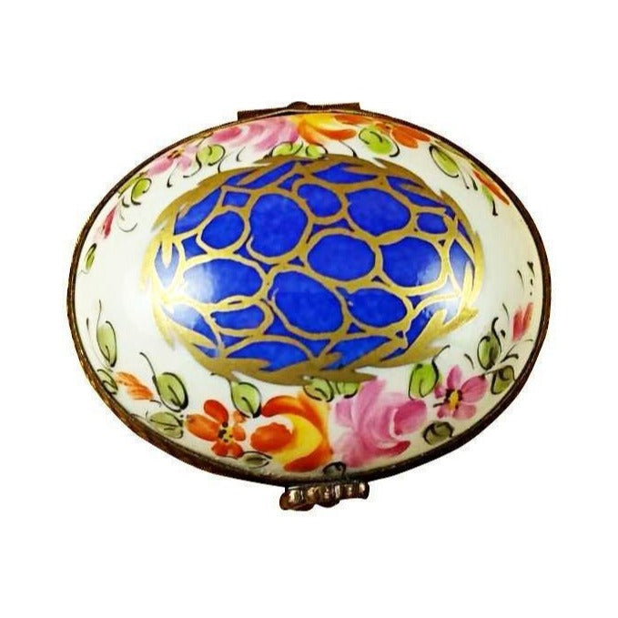 Artisan-painted Blue Oval Gold Circles Limoges box from France, a cherished collectible