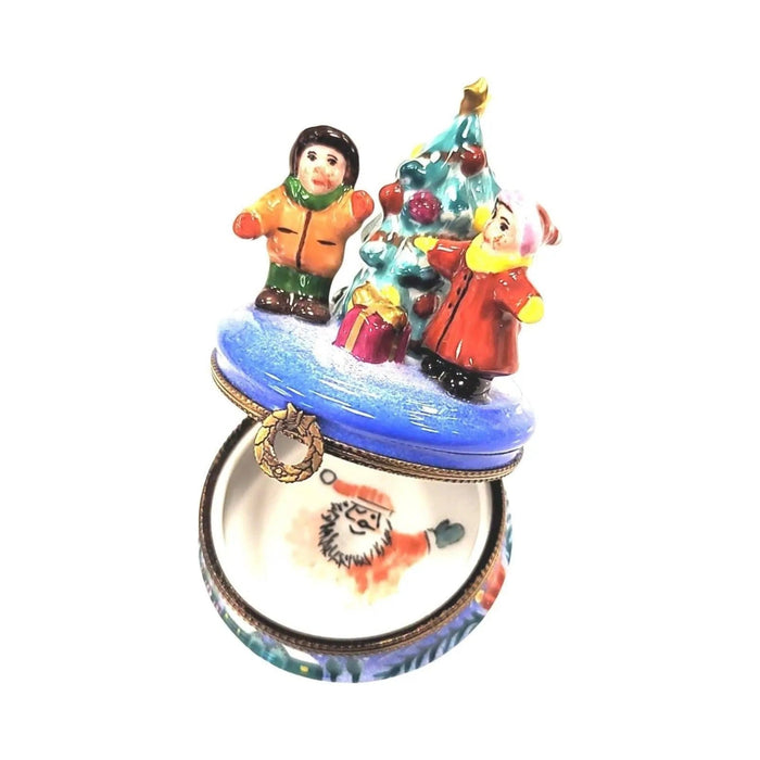 Fine French craftsmanship on the Children Waiting Christmas Morning Limoges box, painted by hand
