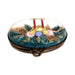 Every brushstroke by hand on the Christmas Eve Candles Mistletoe Limoges porcelain from France