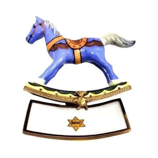Painted details on the Christmas Rocking Horse Sheriff Limoges box, French art in miniature