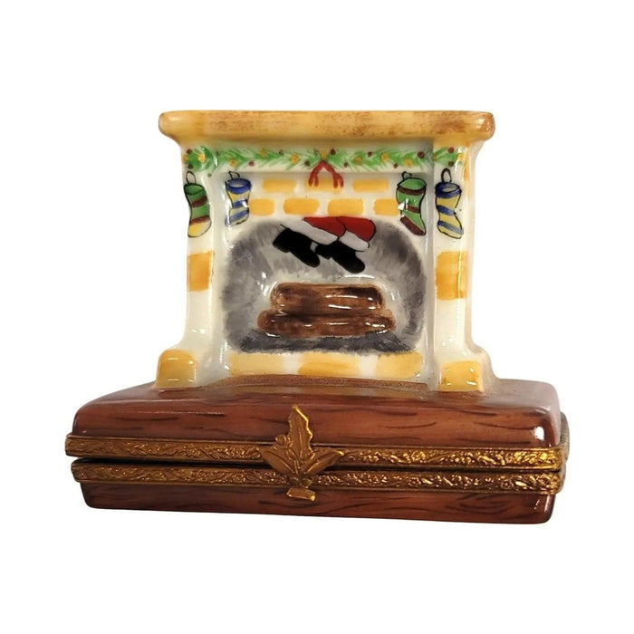 Limoges Boutique presents the Santa in Fireplace Christmas, a genuine Limoges box painted by hand in France