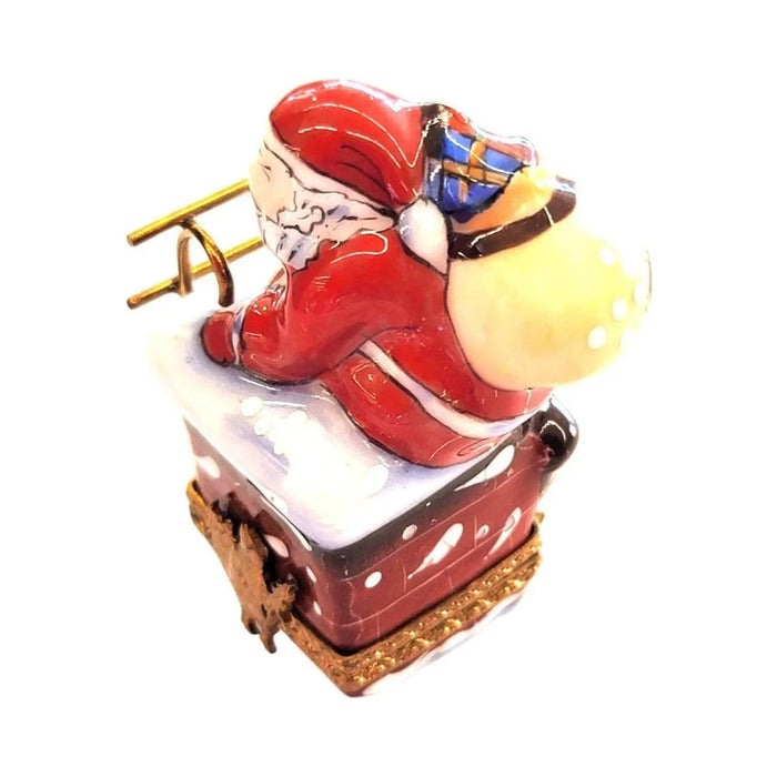 Fine French craftsmanship on the Santa on Chimney Limoges box, painted by hand